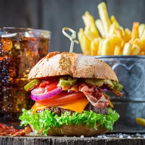Afghani Burger with Fries and can of soda